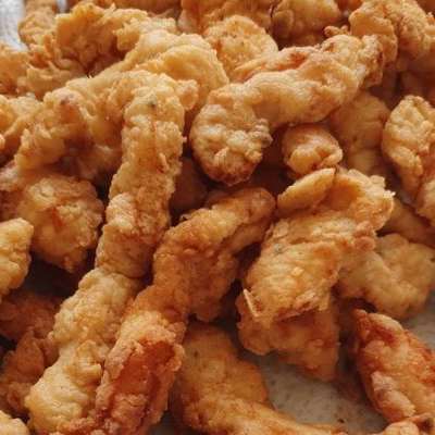 Iscas de Frango à Milanesa 