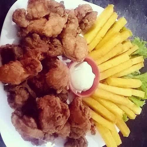 Frango a passarinho com Polenta