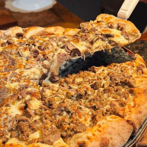 Pizza grande  + Borda grátis 