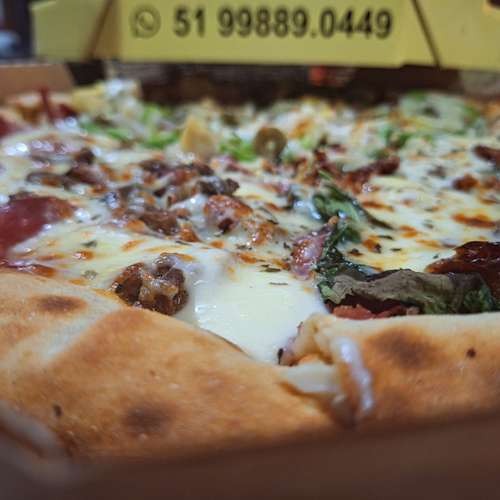 2 Pizzas Grandes com Borda + 1 Refri 2L