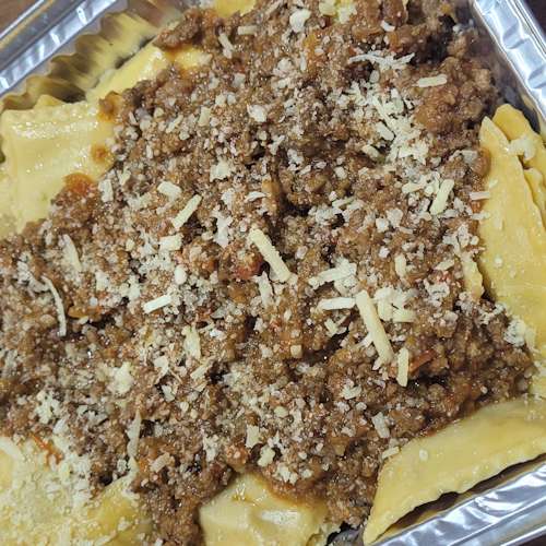 Tortei ao molho de Bolonhesa